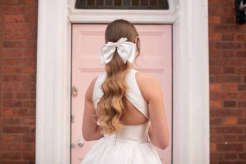 Svatební účes s elegantní mašlí